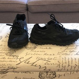 Black Reebok sneakers